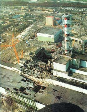 Chernobyl Disaster Aftermath:very extensive damage to the main reactor hall (image center) and turbine building (image lower left)