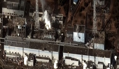 The Fukushima I Nuclear Power Plant after the 2011 Tōhoku earthquake and tsunami. Reactor 1 to 4 from right to left.